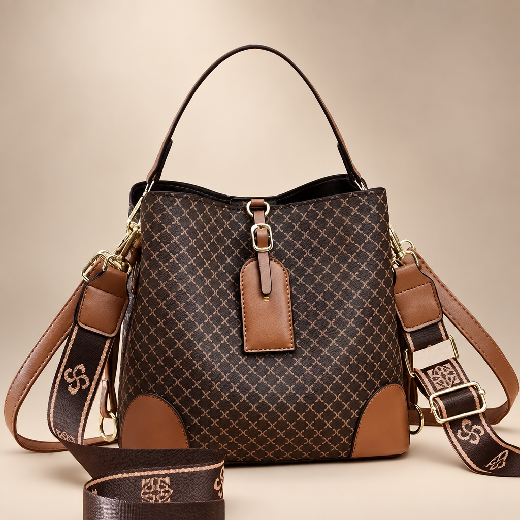 Plaid handbag photographed on a warm ivory studio background