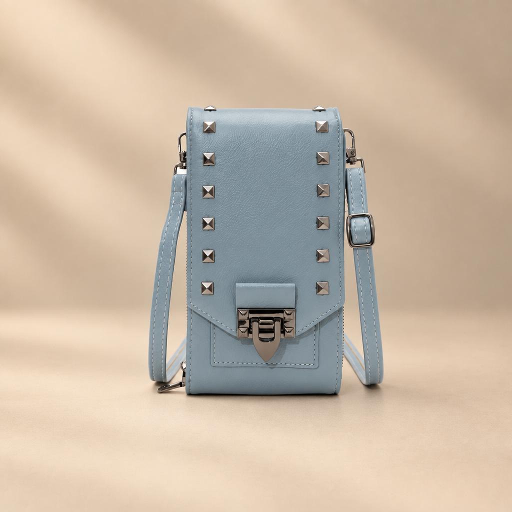 Rivet shoulder bag on warm ivory studio background, view 3