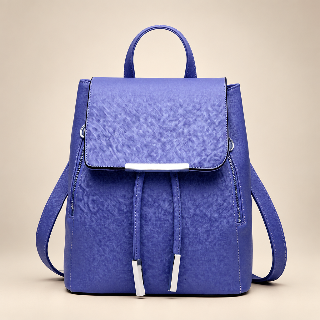 Women's flap backpack in violet on a warm ivory/taupe studio background