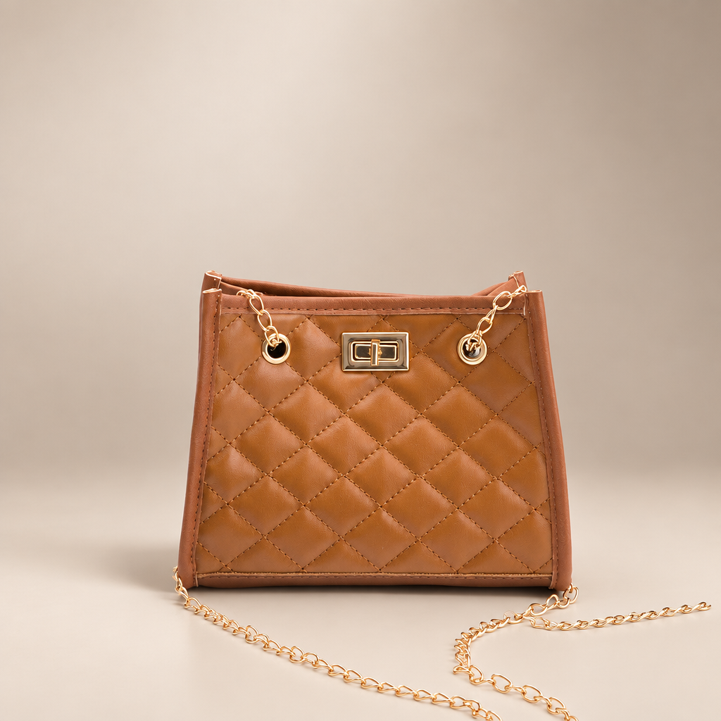 Brown quilted mini chain shoulder bag on a warm ivory/taupe studio background