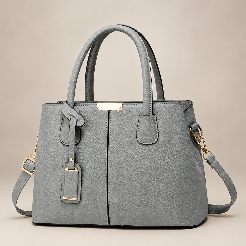 Grey tote bag on warm ivory studio background