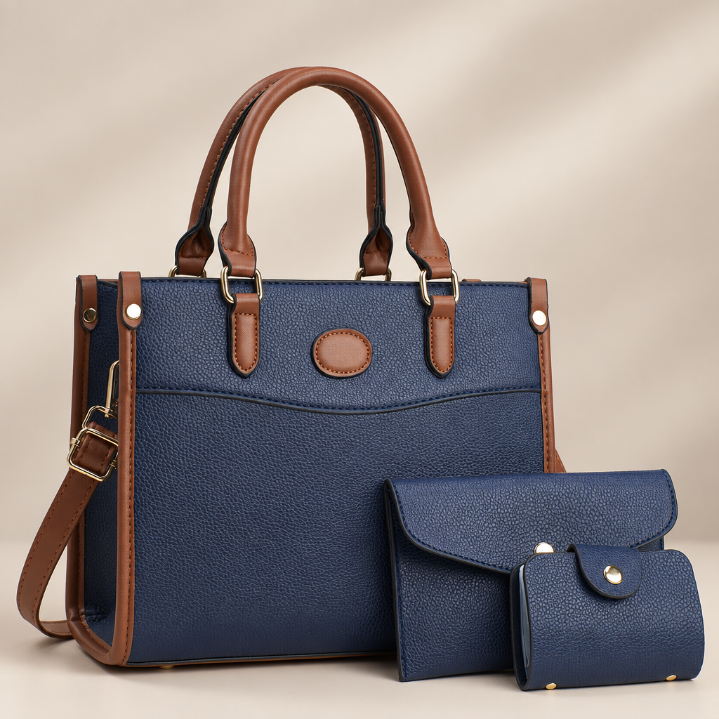 Blue three-piece shoulder bag set on warm ivory studio background