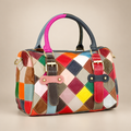 Colourful patchwork leather handbag, front view, on a warm ivory/taupe studio background