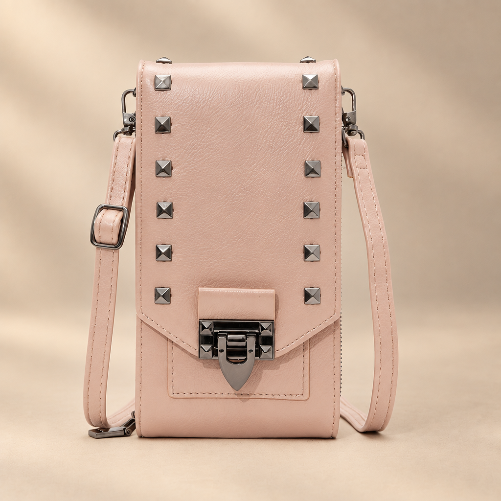 Rivet shoulder bag on warm ivory studio background, view 1