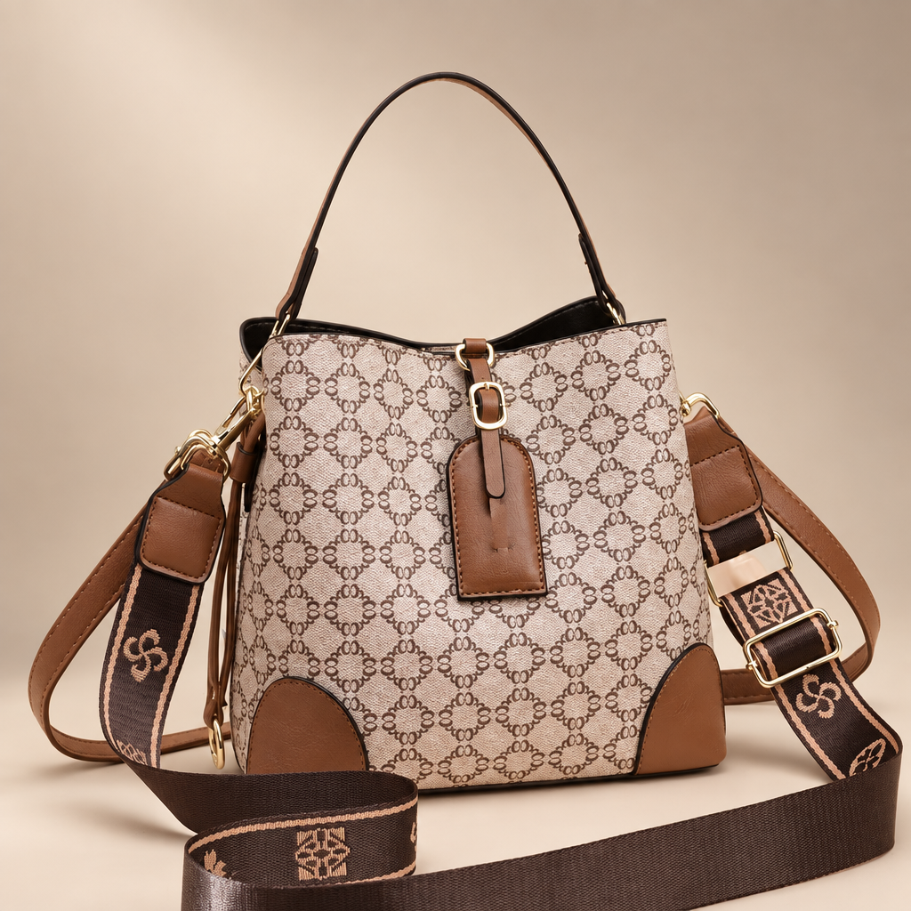 Plaid handbag photographed on a warm ivory studio background