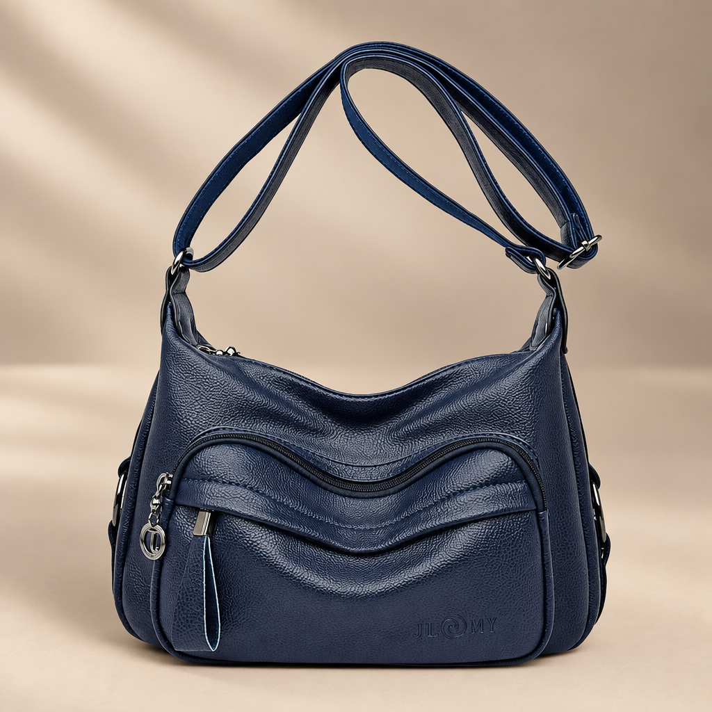 Handbag on warm ivory studio background