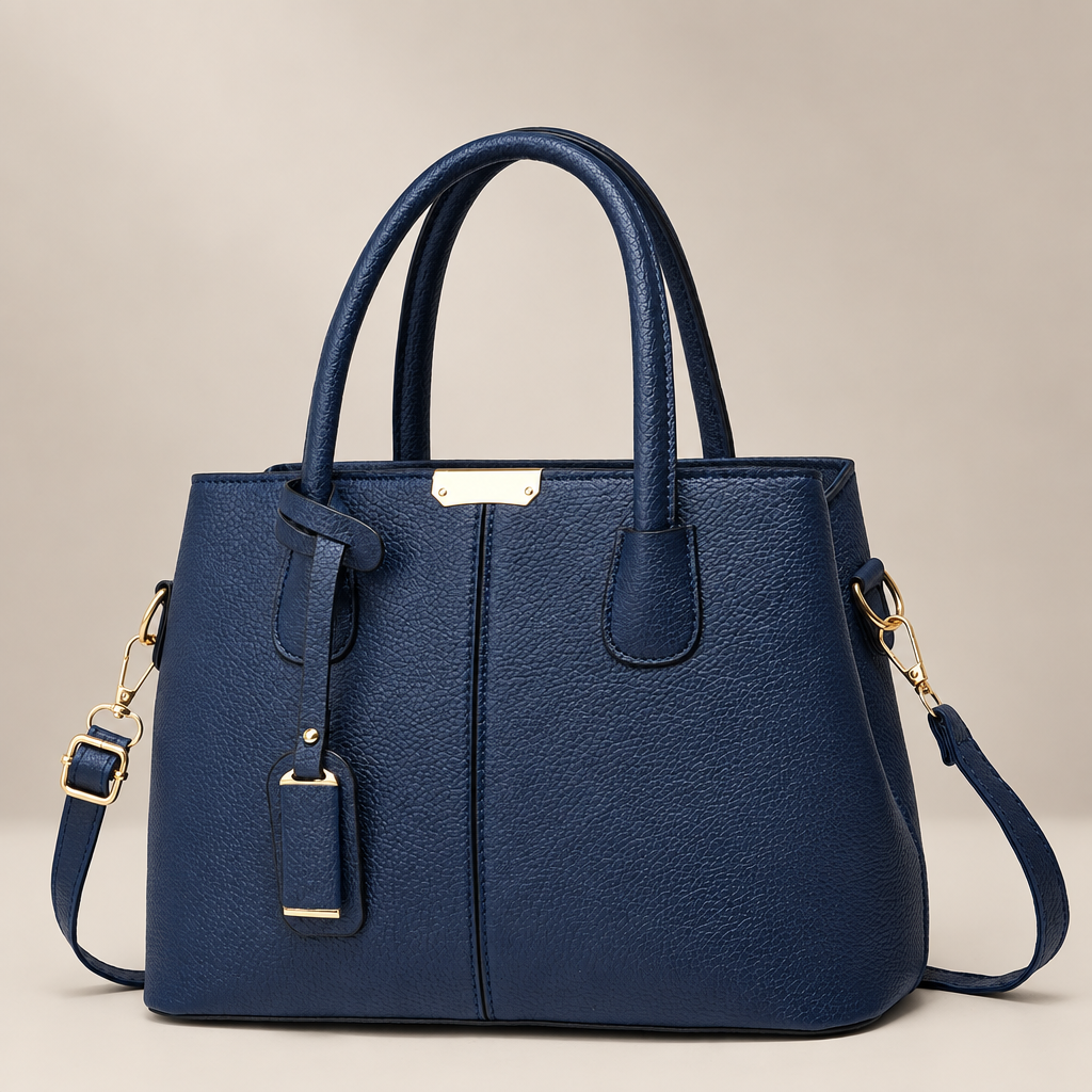 Blue tote bag on warm ivory studio background