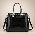 Handbag on a warm ivory studio background