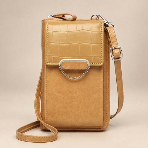 Chain-detail phone shoulder bag on a warm ivory and taupe studio background