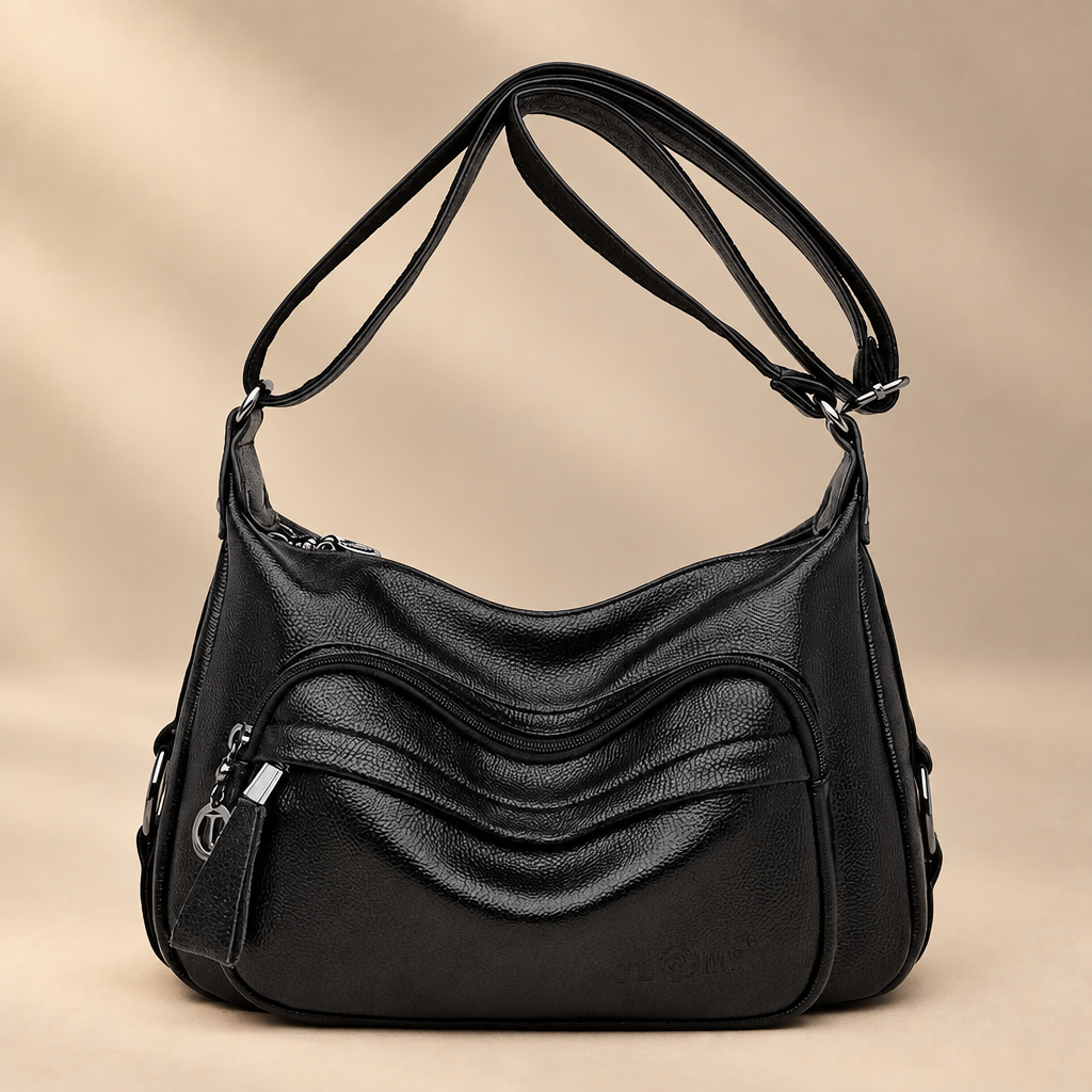 Handbag on warm ivory studio background